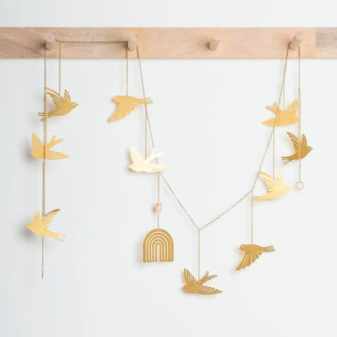 brass string of birds