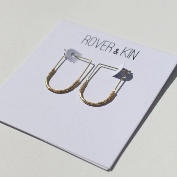 gold beaded drape earrings