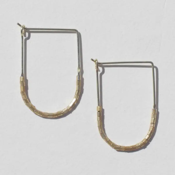 gold beaded drape earrings