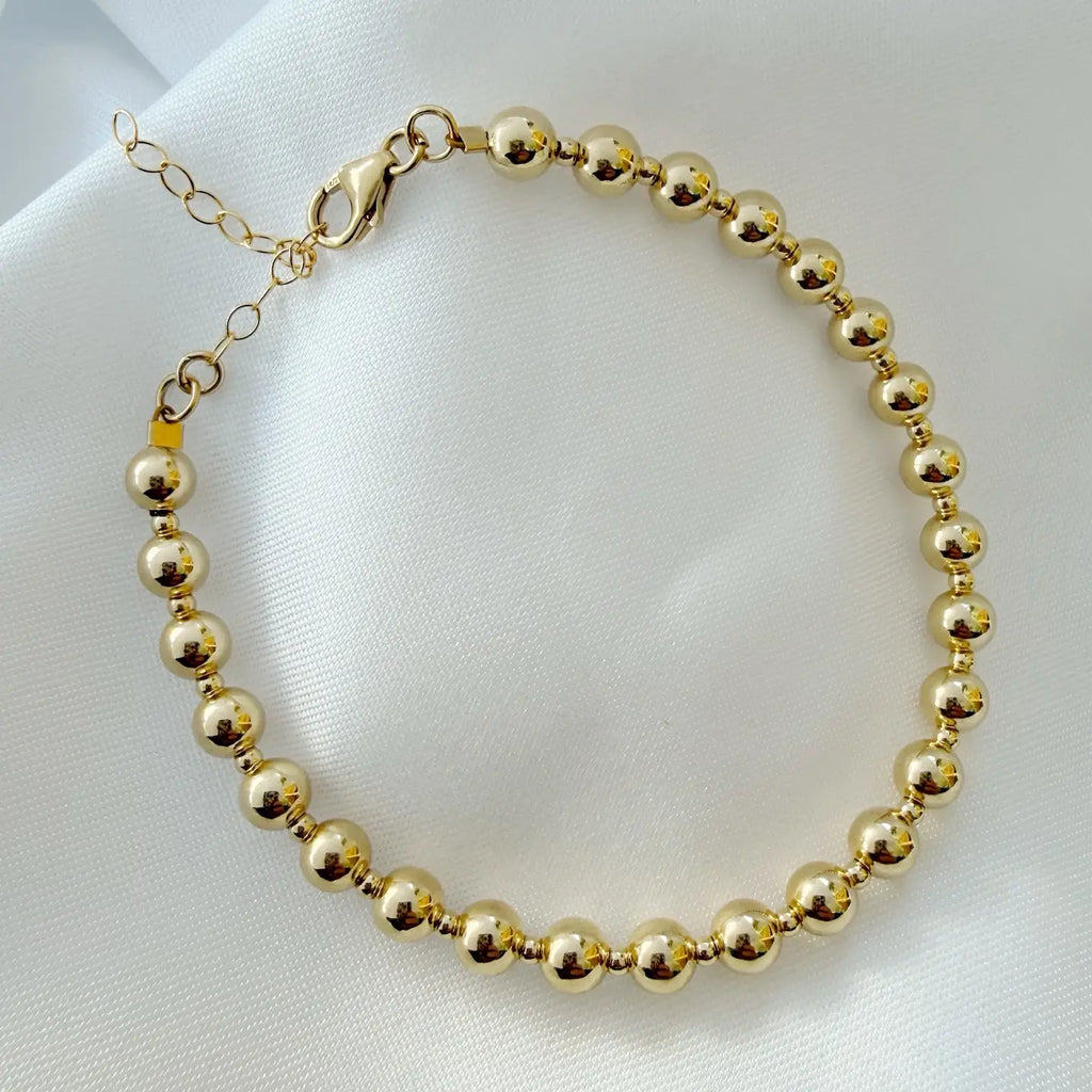 gold petite layering bracelet